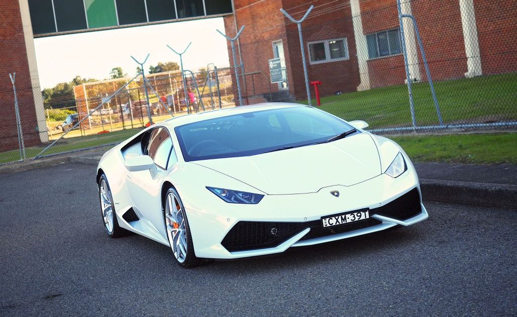 white ferrari wedding car